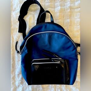 CK Blue Nylon Unisex Backpack
Compact & stylish double-zip front, 10"W X 12”H